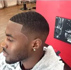 Professional fade haircut at Docia and Aisha Braiding Lounge and Barbershop in Willingboro NJ